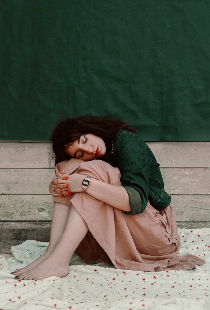 woman sitting on floor